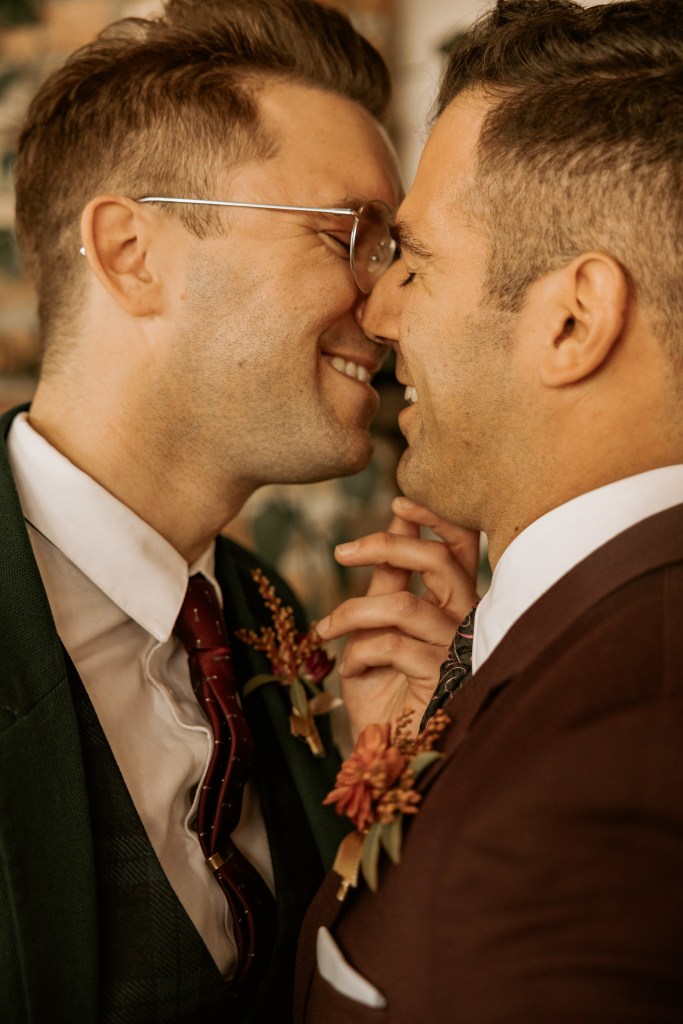 gay couple wedding kiss