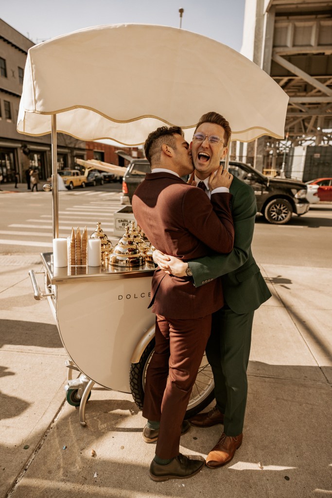 gay couple wedding day embrace with ice cream Brooklyn NYC